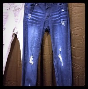 Destroyed blue jeans wax jeans